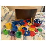 Tupperware shape sorter, stacking toys, building