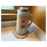 Vintage air pot, shell trivet