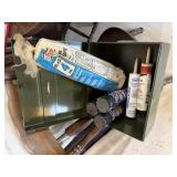 Metal box, spray paint, roll of drop cloth, caulk