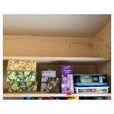 Shelf of consumables, tissues, lightbulbs