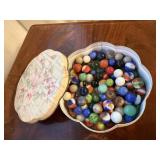 Tin of marbles