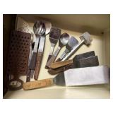 Contents of kitchen utensil drawer, advertising