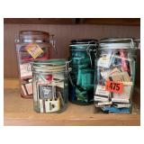 Canisters of matchbooks (4)
