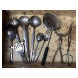 Serving utensils, tongs, cocktail strainer