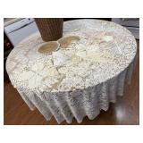 Basket, lace tablecloth, chargers