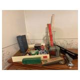 Office supplies, paper punch, rulers, scissors