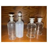 Glass apothecary jars (4)