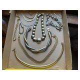 Metallic costume necklaces