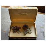 International charm bracelet, pin