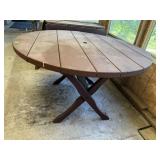 Round wooden picnic table