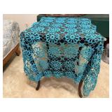 Teal crocheted tablecloth
