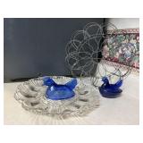 Egg basket, plate, hen on nests