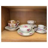 Tea cups, saucers (4 pairs)
