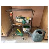 Wire shelves, garden supplies, watering can