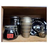 Brass vase, black canisters, plate, bud vase