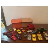 Box of Matchbox, assorted toy cars, tractors