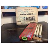 Cardboard advertising sign, candlesticks