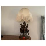 Table lamp with fringe shade