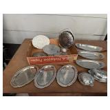 Silver plated trays, trivets, serving pieces