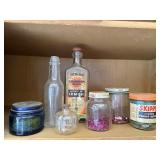 Shelf of vintage bottles, jars