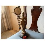 Linden pendulum figurine clock