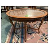 Oval glass top side table