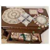 Doilies, table runners, crocheted handiwork