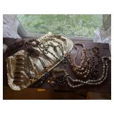 Gold clutch, jewelry included