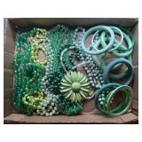 Beaded necklaces, bangle bracelets, flower pin