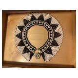 Beaded collar, cameo brooch