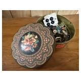 Tin of buttons