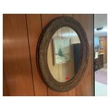 Gold oval mirror