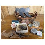 Basket of bits, keys, drawer pull, casters,