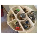 Tray of padlocks, bicycle bell, pocket knife