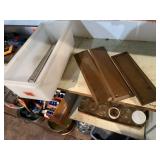 Metal door plates, scraps, Tupperware storage
