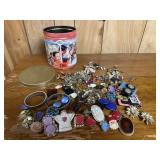 Tin of costume, vintage jewelry, earrings,
