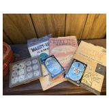 Basket of playing cards, game books