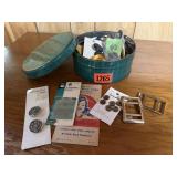 Mint tin of buttons, sewing notions