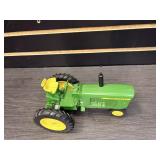 John Deere tractor with mounted corn picker