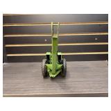 John Deere toy tractor with mounted corn picker