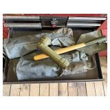 Shin covers, flashlight, emergency shovel