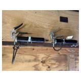Wall mounted grease guns (2)
