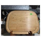 Handled cutting board