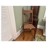 Caned seat carved back dining chair