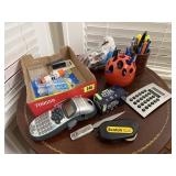 Office supplies, calculator, label maker, binder