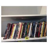 Shelf of DVD movies, television series, Golden