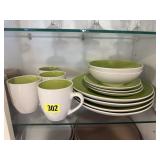 White & green matching dishes, mugs, plates,