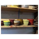 Shelf of flower pots, garden stakes
