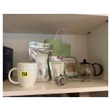 Tea lot, glass teapot, mug, tea