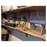 Shelf of bird feeders